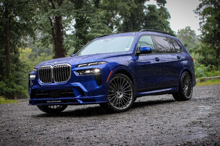 2023 BMW Alpina XB7 SUV in blue sitting in the rain