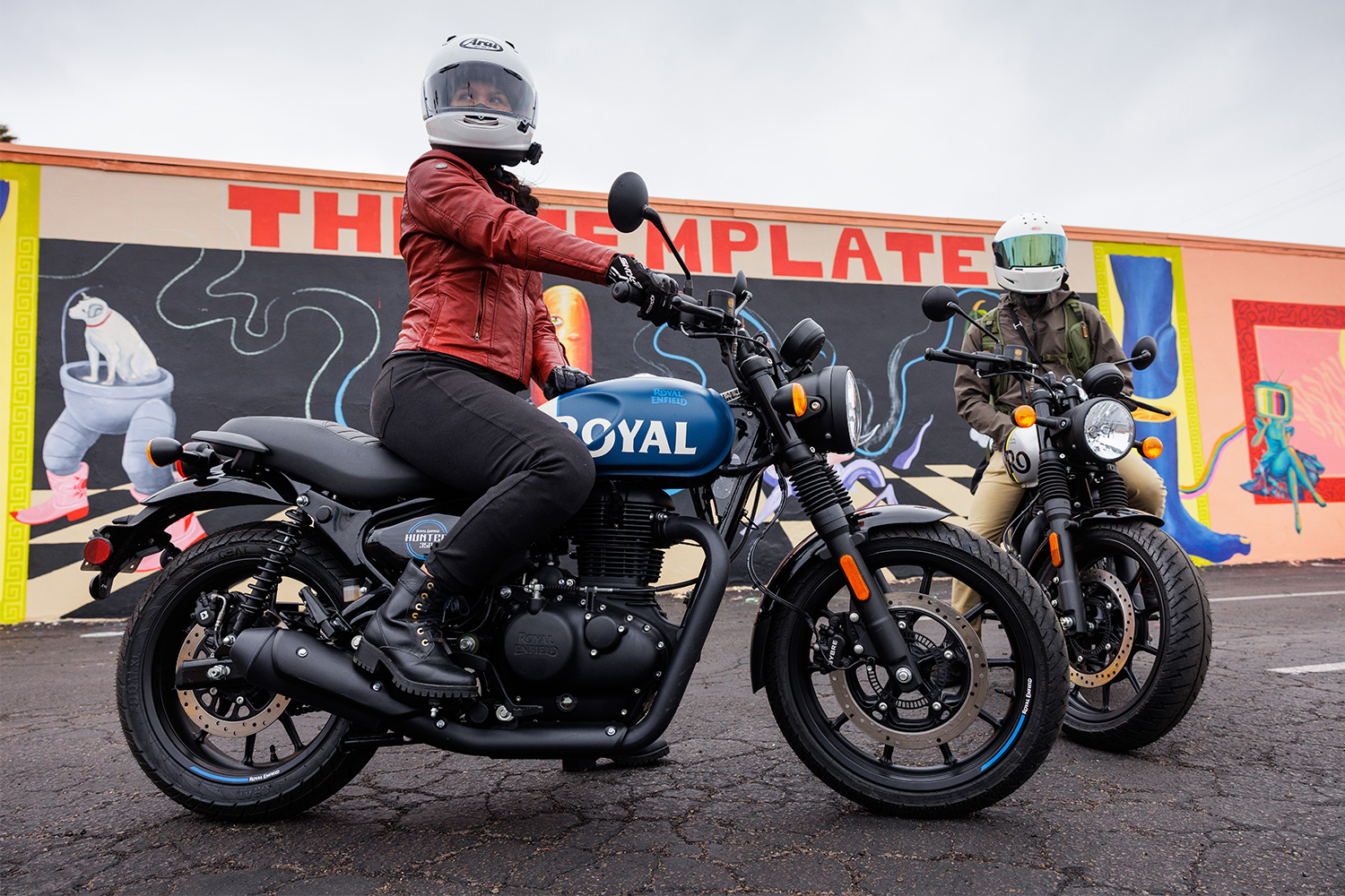 Two riders on Royal Enfield Hunter 350 motorycles
