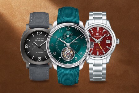 A gray watch, a green watch and a silver and red watch