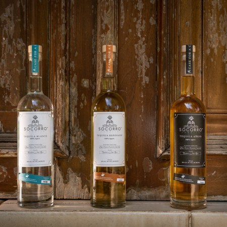 Three of Socorro Tequila's bottles: blanco, reposado and añejo