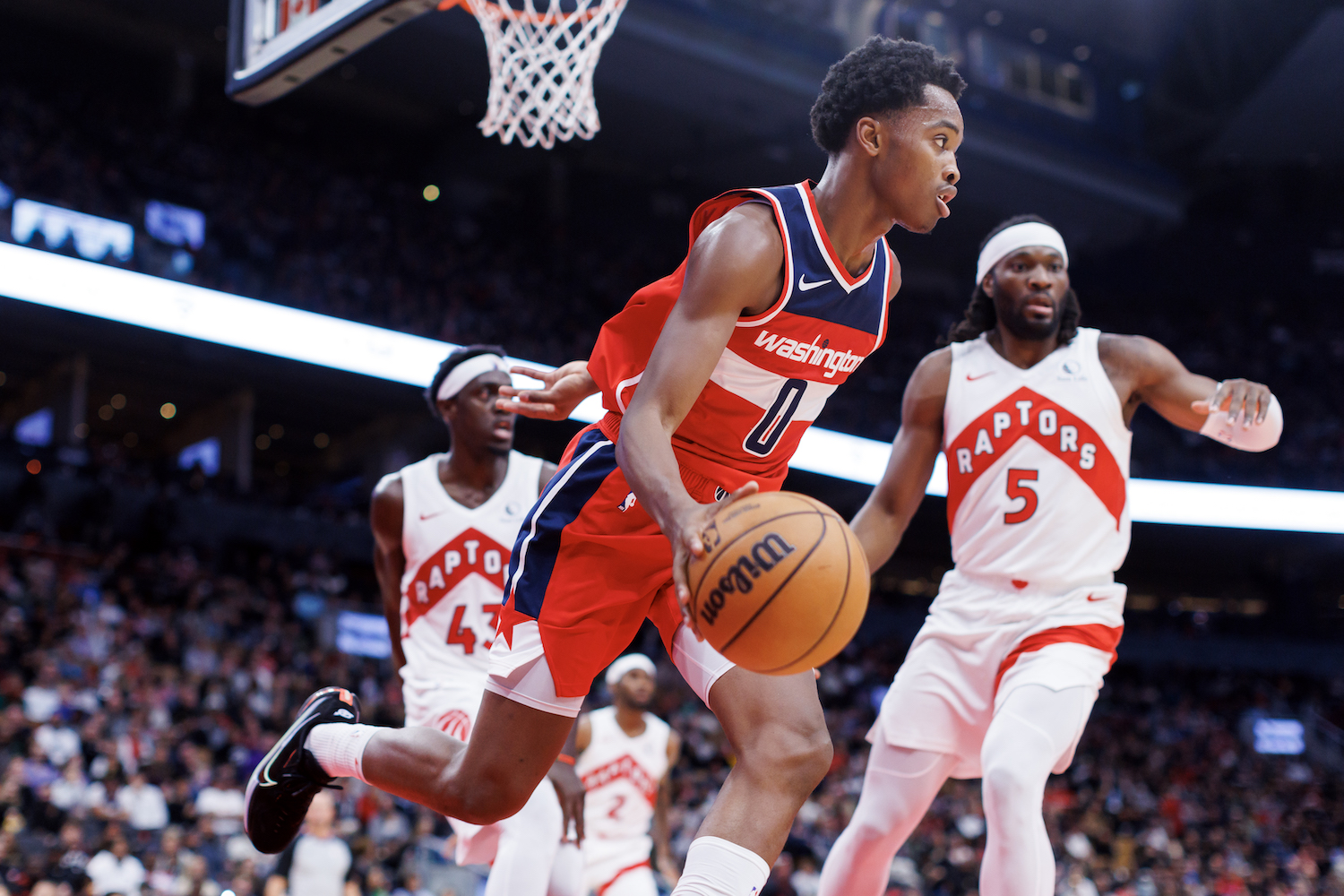 Bilal Coulibaly #0 of the Washington Wizards dribbles the ball during the second half of their NBA game against the Toronto Raptors at Scotiabank Arena