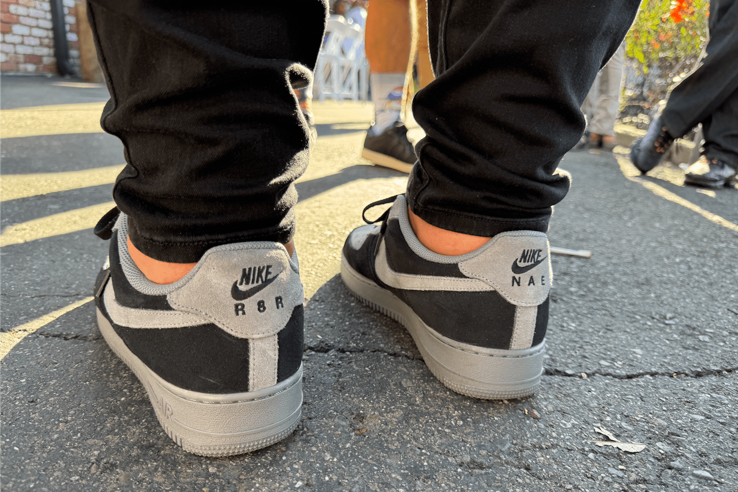 Back of Nike Air Force Ones with initials printed on them