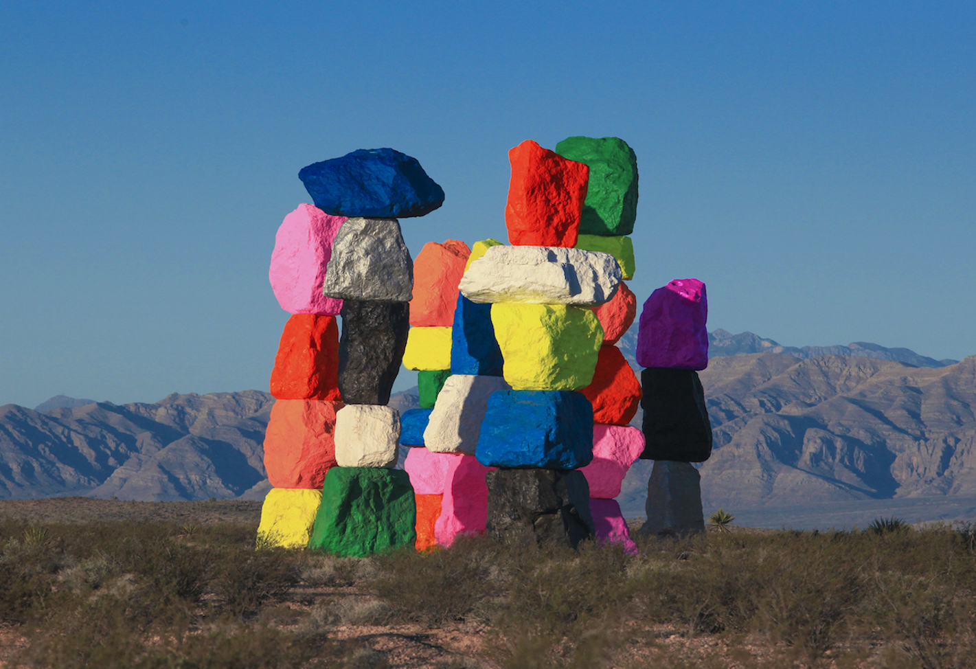 Colorful rocks piled on top of each other in a desert