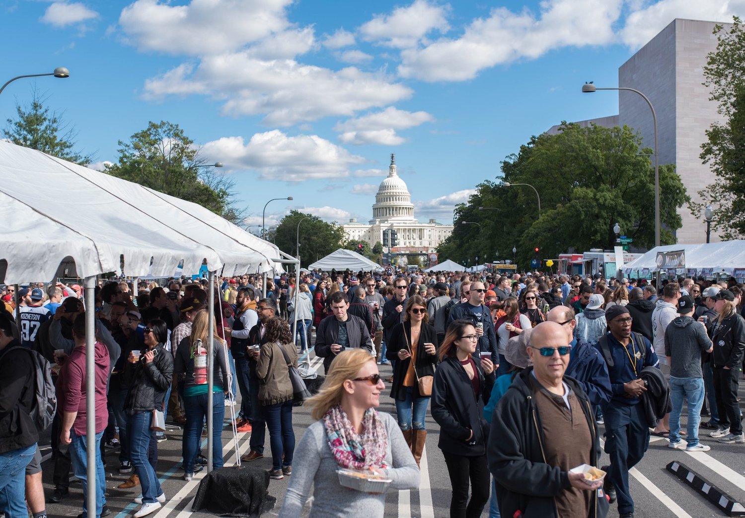 Crowd of people and tents in front of Capitol Hill for the beer festival Snallygaster