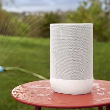 Sonos Move 2 outdoors near a sprinkler