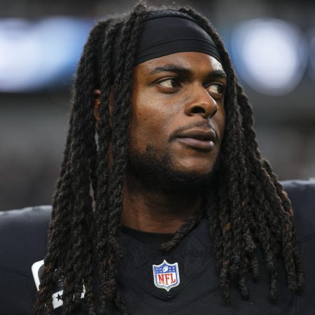 Davante Adams of the Las Vegas Raiders warms up prior to a game.