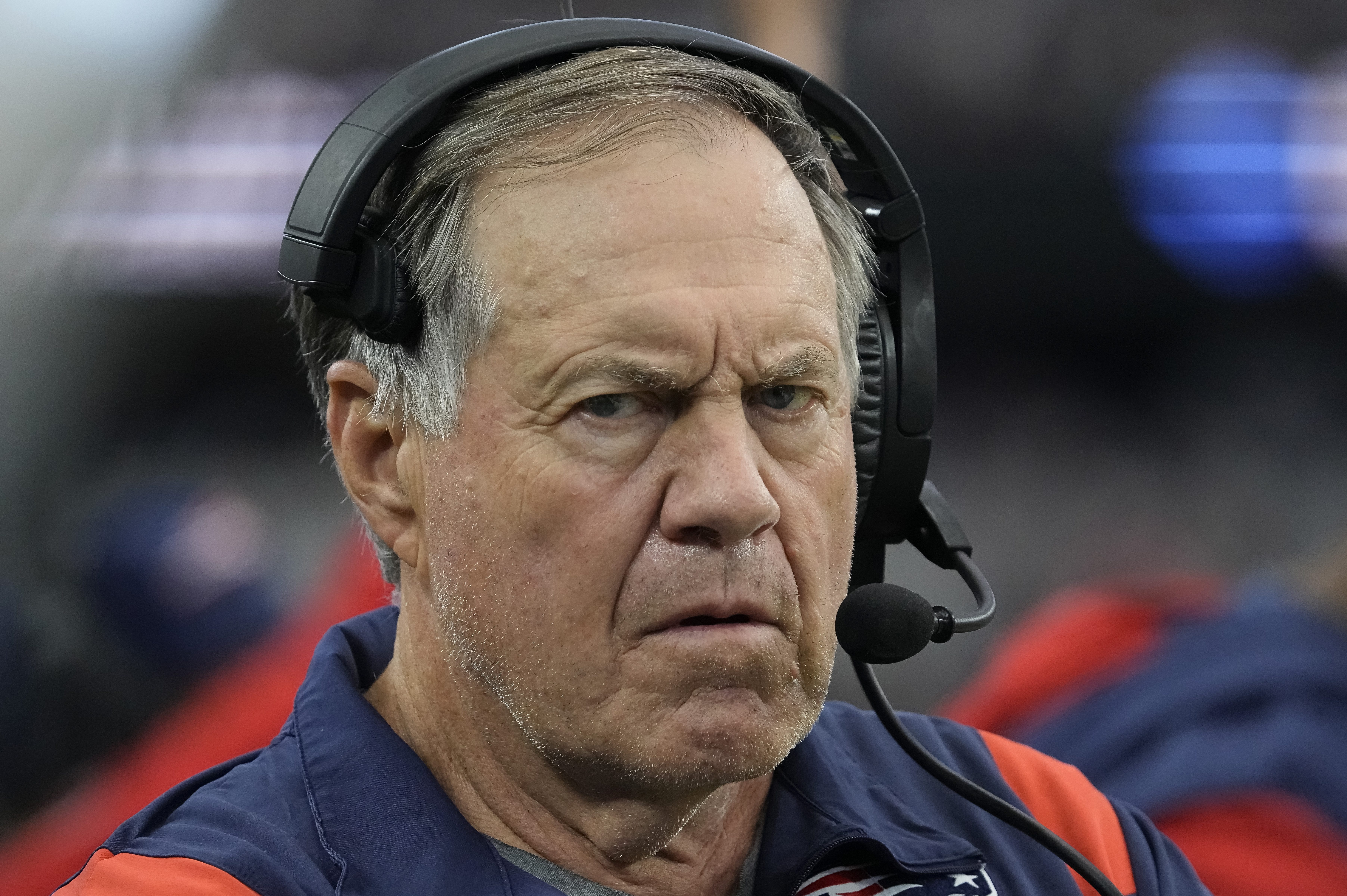 New England coach Bill Belichick stands on the sideline.