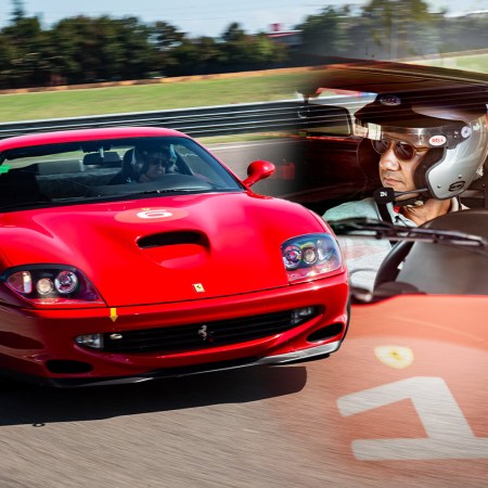 Automotive writer Basem Wasef behind the wheel of a classic Ferrari at the brand's Corso Pilota Classiche driving school