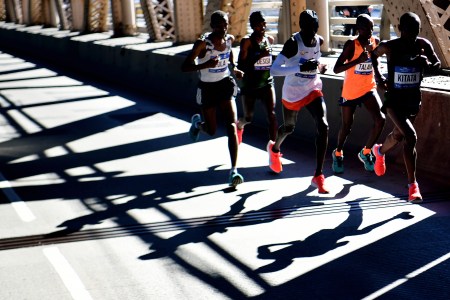A pack of elite runners at the front of the New York Marathon. Want to run faster? Try using heart rate zones.