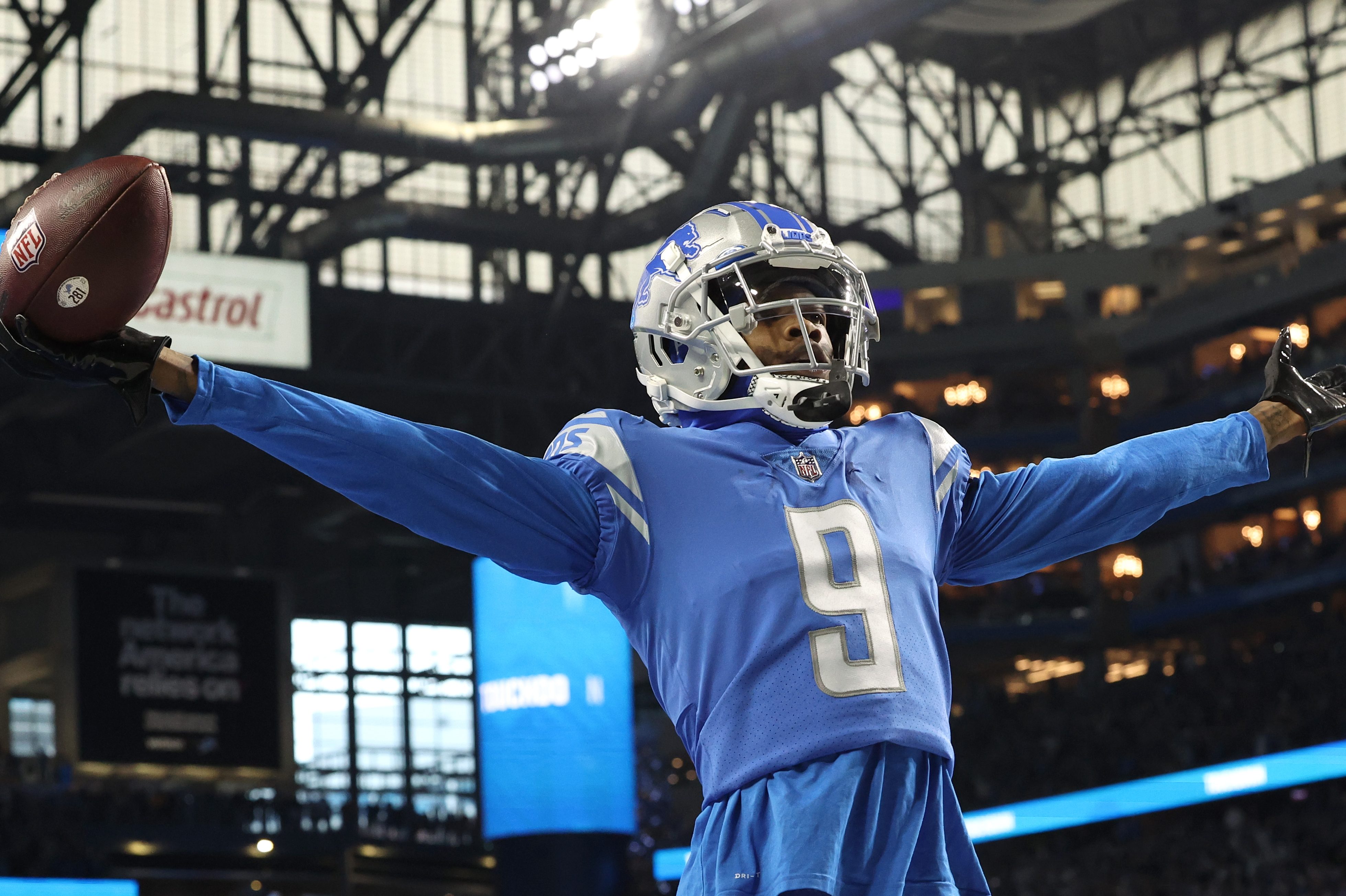 Jameson Williams celebrates a touchdown against the Vikings.