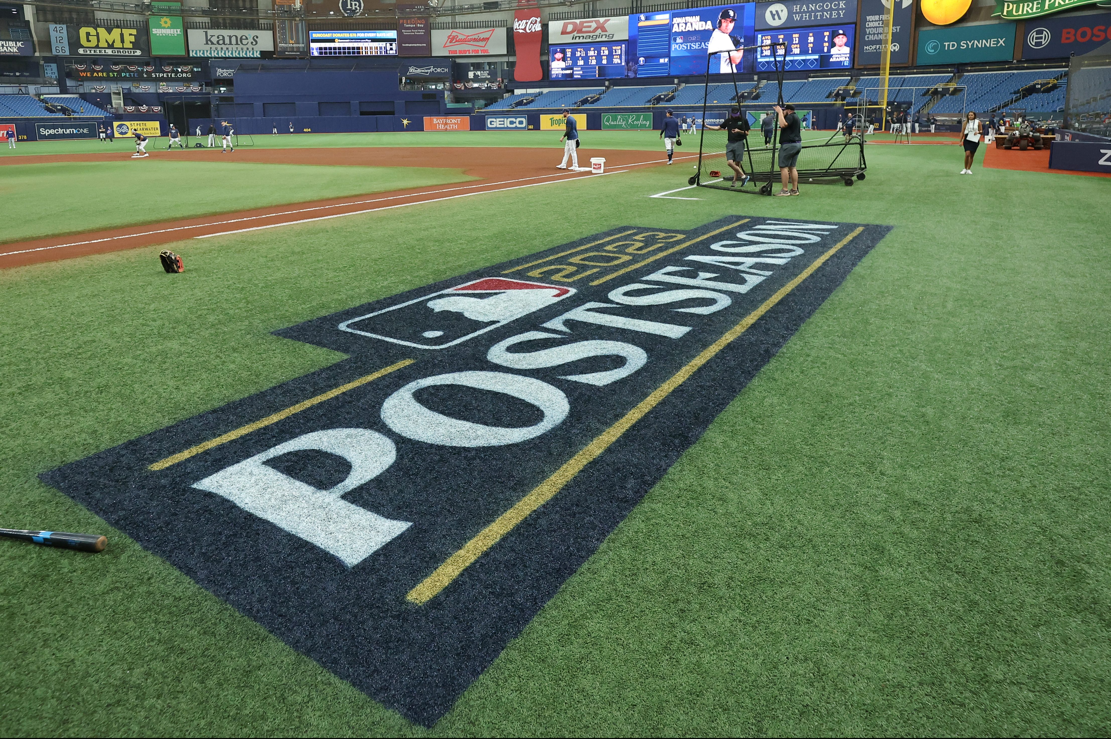 MLB's postseason logo on the field before a Wild Card series.
