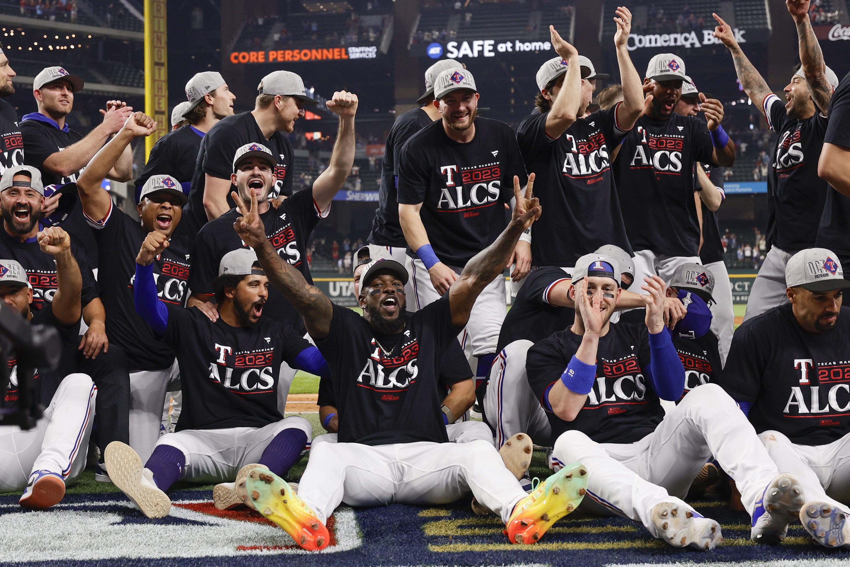 Texas players celebrate after defeating the Orioles in the Divisional Series.