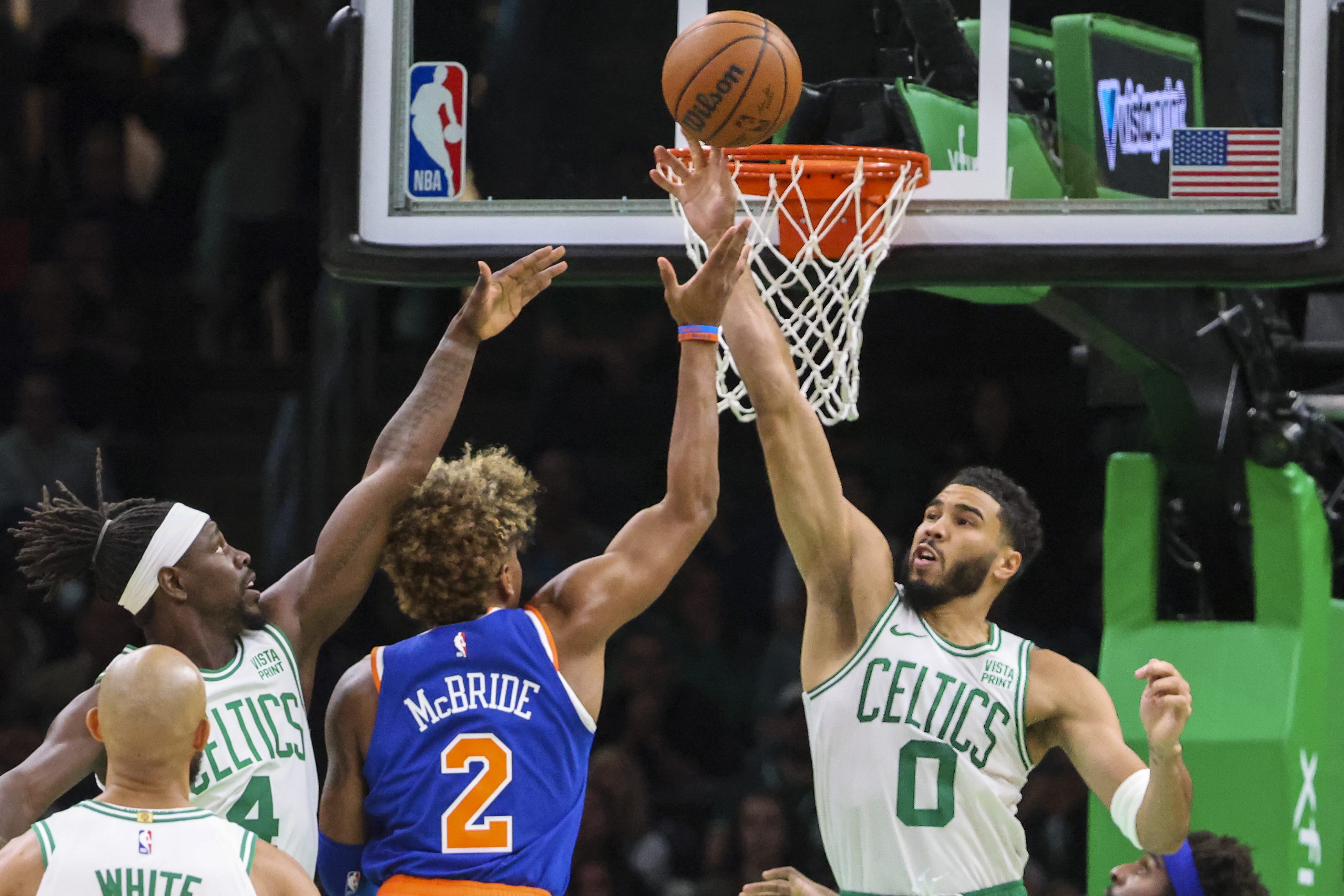 Jayson Tatum blocks a shot from Miles McBride.