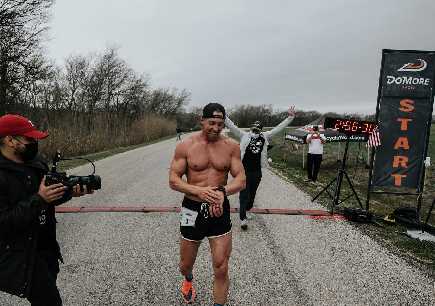 Nick Bare crosses the finish line in 2:56:30.