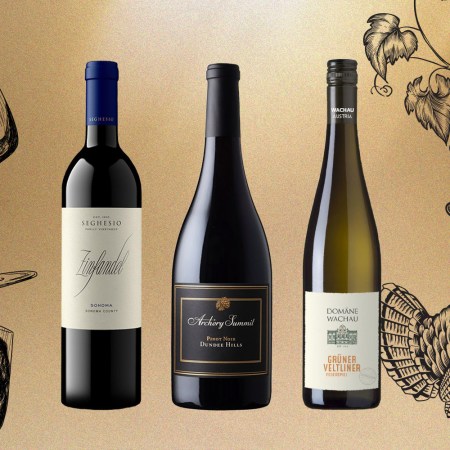 three bottles of wine on a tan background with thanksgiving illustrations
