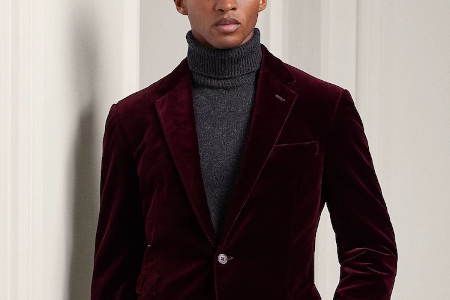 a model wearing a ralph lauren turtleneck under a velvet blazer