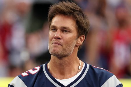 Tom Brady speaks during a return to New England.