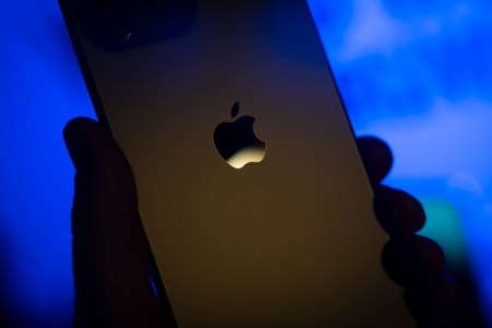 Apple logo on iPhone. The tech company just announced they are extending free service of their Emergency SOS satellite feature.