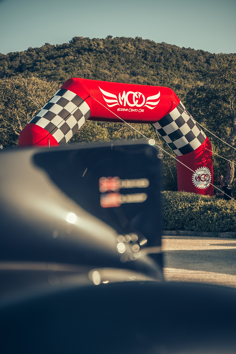 A red starting gate at the Modena Cento Ore