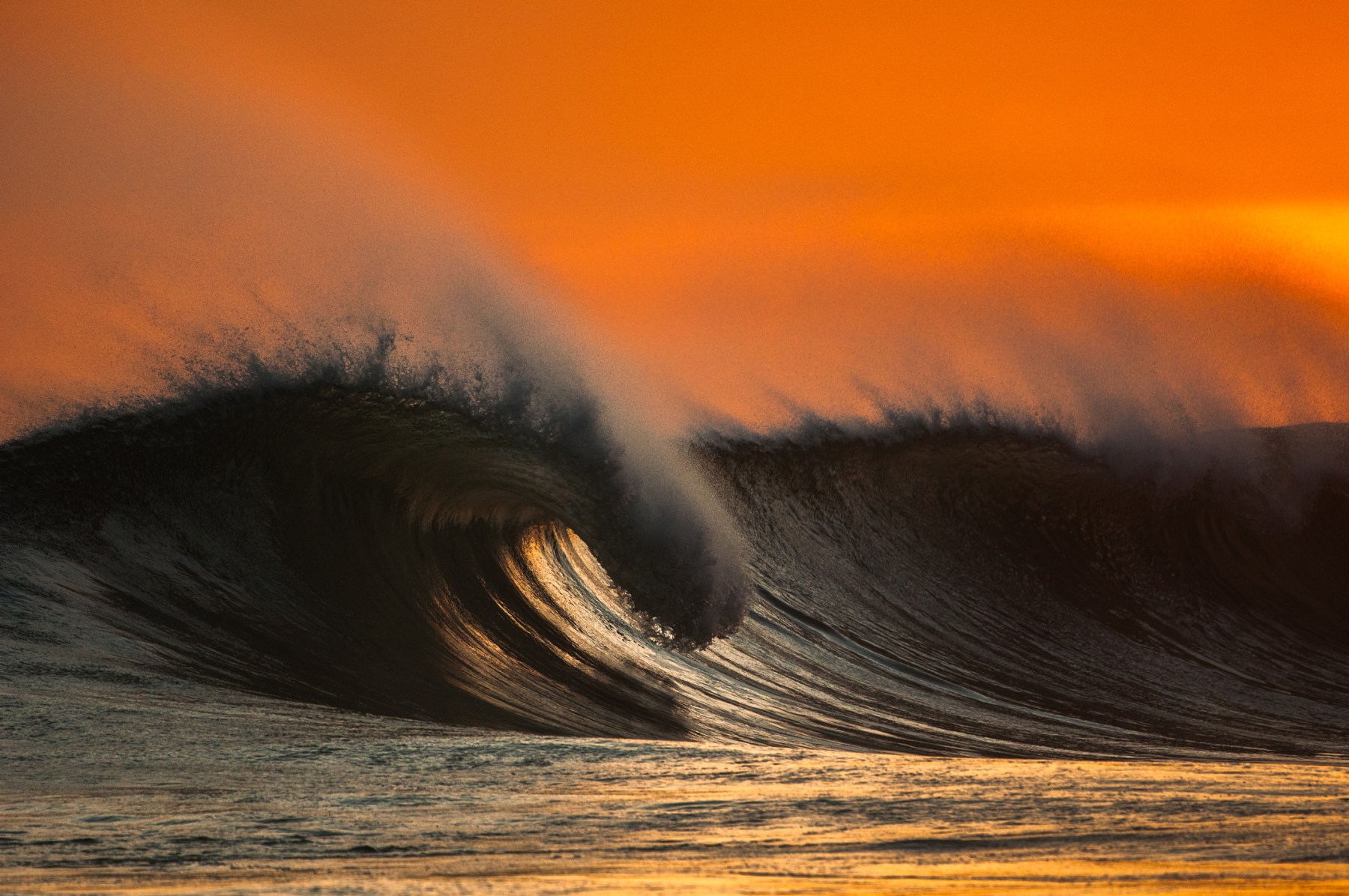This is a Nicaraguan sunset. Shooting empty waves has always been a passion of mine. It's one of the things that I love the most about ocean sports. In skateboarding, you're not shooting a curb and posting a photo of a curb on your wall or something. I think the fact we can appreciate empty waves within surf culture is amazing. I love that we can kind of mind-surf and dream about it. This is one of those mind-surfing situations and it kind of sums up the Central American surfing experience.