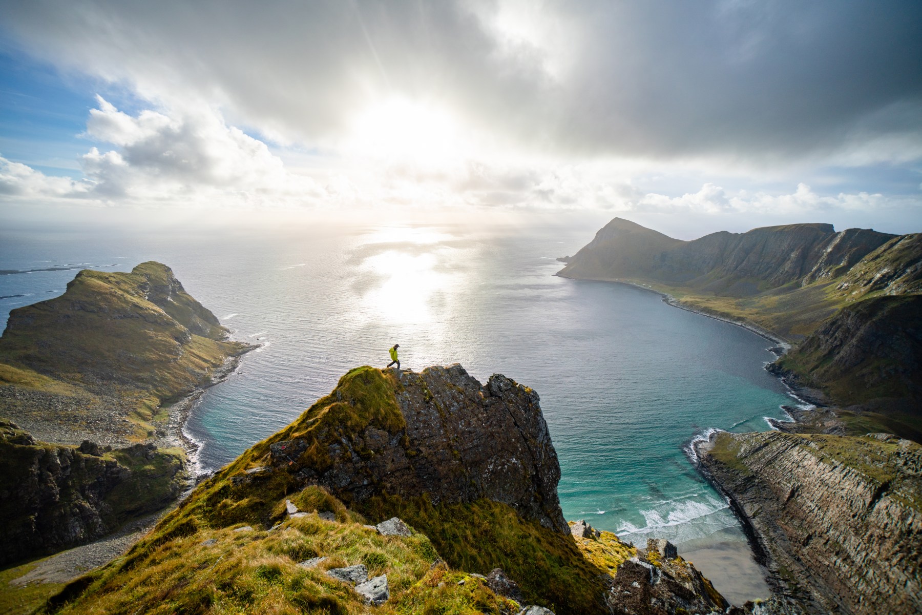 This is on an island off of the coast of Norway in the Lofoten island chain. It's a really hard-to-get-to spot called Vaeroy. It's at the end of this beautiful granite chain of mountains that stick out from the Arctic Circle in Norway. I think this one particular view is so stunning because of how it kind of encompasses this beautiful secluded bay and beach. I was just blown away by being there. I had always wanted to go to this island. We sailed there on a boat, which made it even more rad because normally you'd fly or take a little ferry. We actually sailed the whole Lofoten chain and arriving at this final destination was special and felt kind of significant. My mission as a photographer is to be able to educate and share these experiences with others so that they can hopefully foster the same element of love for them as I do.