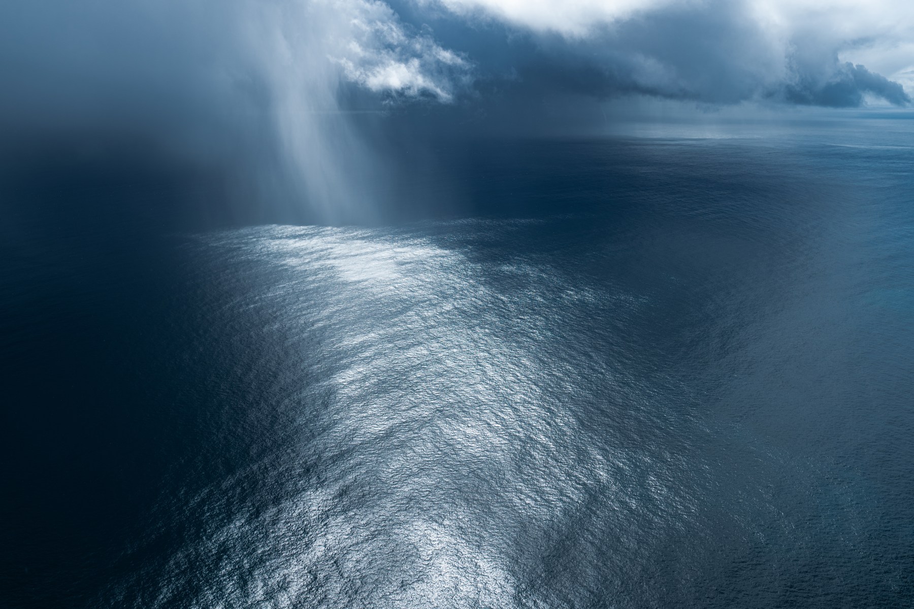 This is right by my house in Big Sur off the coast of California. I shot this last winter from a small Cessna. Normally you'd be up there shooting the dramatic coastline, but in this situation it was the sky and the rain that was fascinating. It’s coming down and in the distance you can see a water spout, which is crazy. It’s an incredible place, and it was a rad location to be able to shoot and grow up and cut my teeth. This is a special one because this is where I started my journey in photography as a kid wanting to go surf and take pictures.
