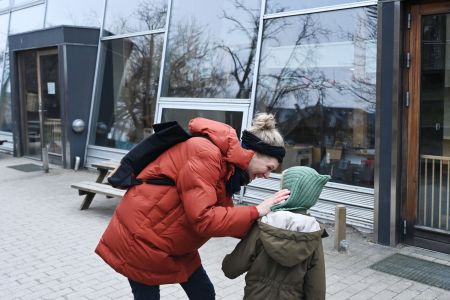A Danish mother dropping off her son at kindergarten.