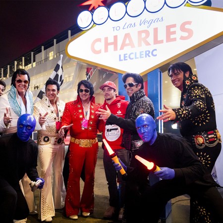 Ferrari F1 driver Charles Leclerc is welcomed at the Las Vegas Grand Prix by Elvis impersonators and the Blue Man Group