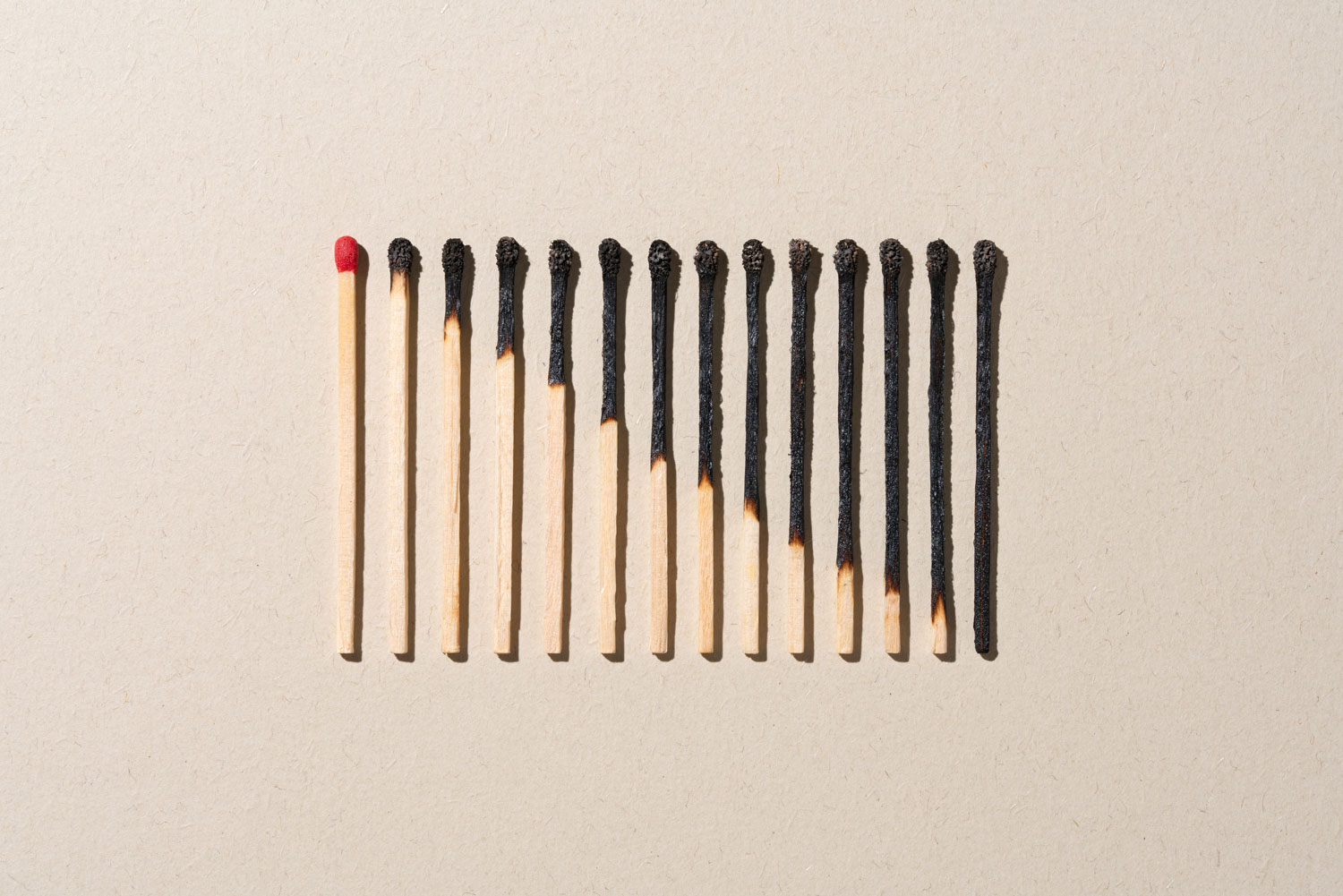 A graphic of matches in a row, each a bit more burnt than the one before it.