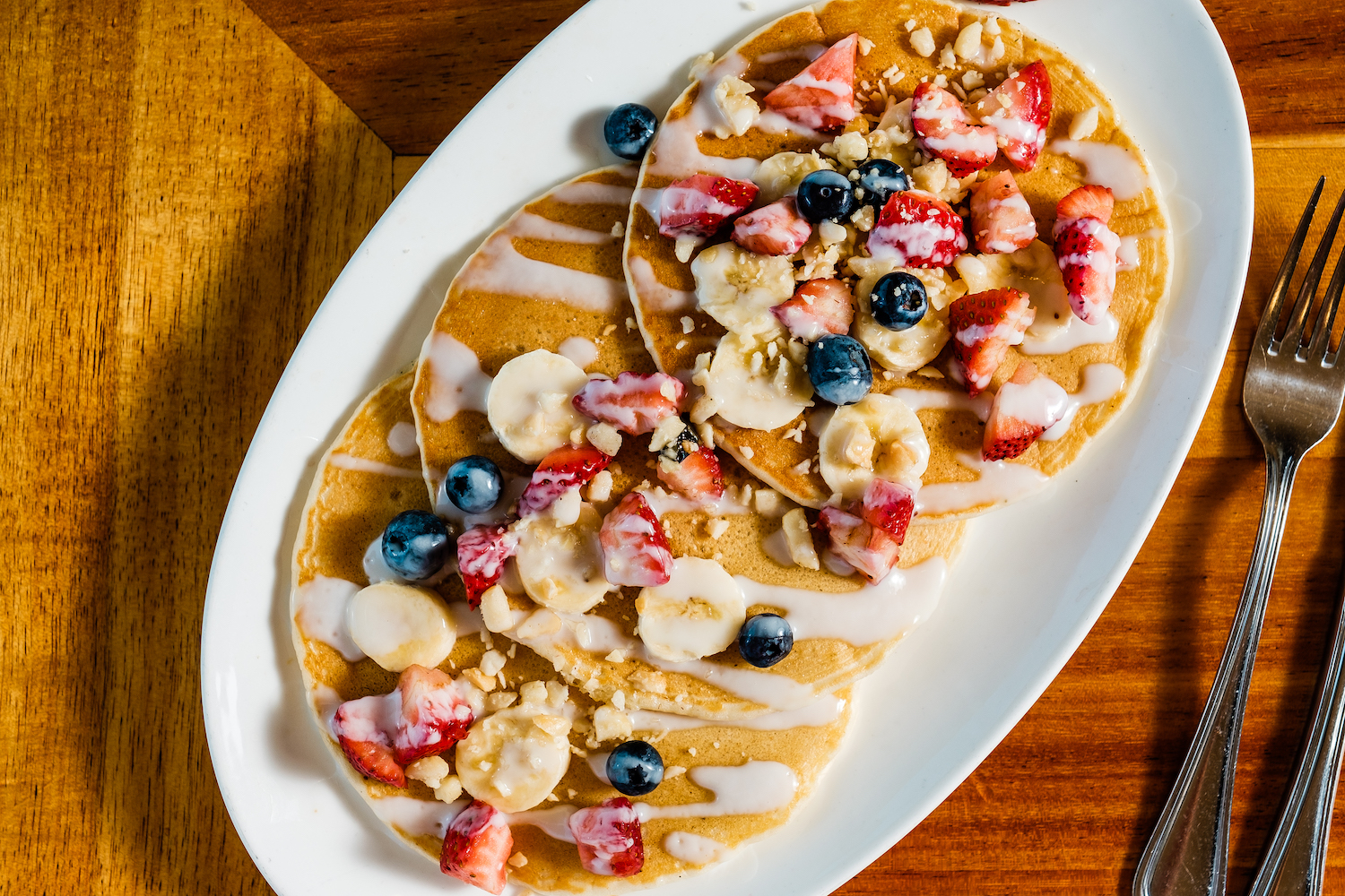 Pancakes with fruit and other toppings
