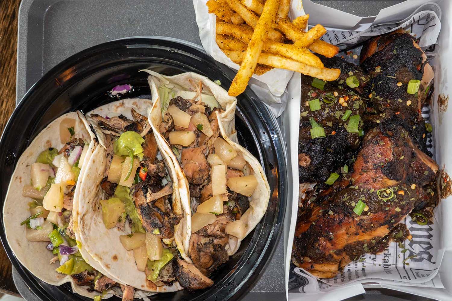Jerk chicken tacos & Masala fries from Jerk Shack in San Antonio
