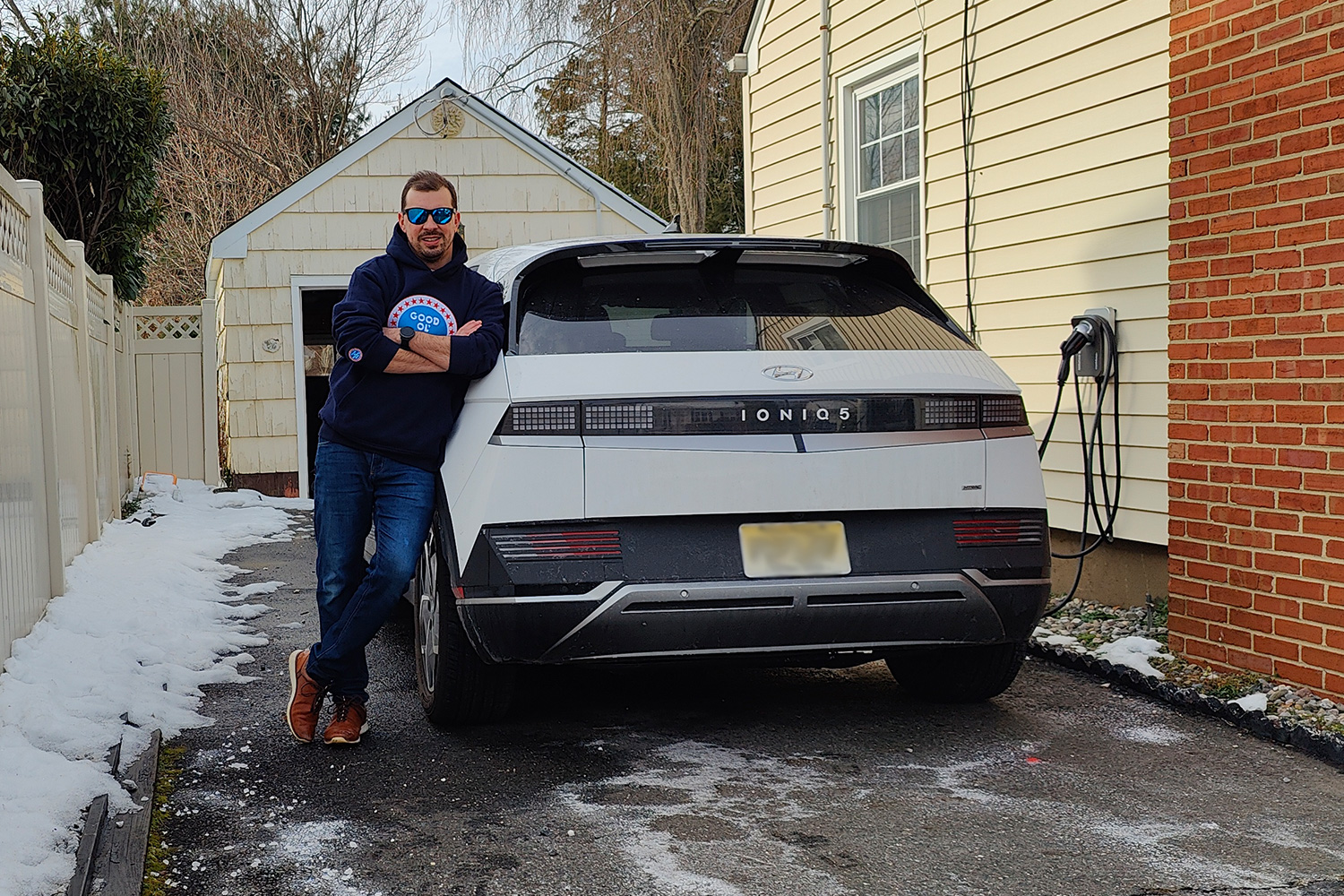 An owner standing next to his Hyundai Ioniq 5 EV