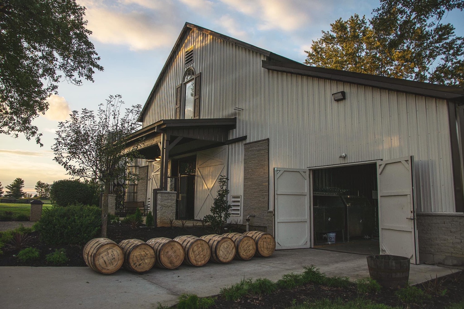 outside of preservation distillery with barrels