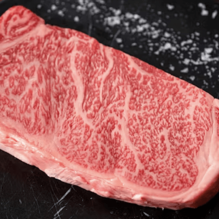 A Japanese A5 Olive Wagyu New York strip steak.