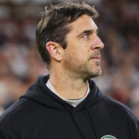 Aaron Rodgers looks on before the Jets kickoff.
