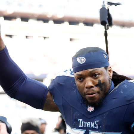 Derrick Henry of the Titans runs off the field.