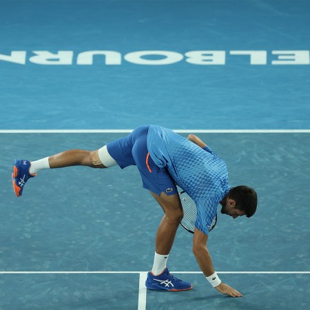 Novak Djokovic leaning over to touch the court in appreciation at the Australian Open. Here's our full guide to the 2024 Australian Open.