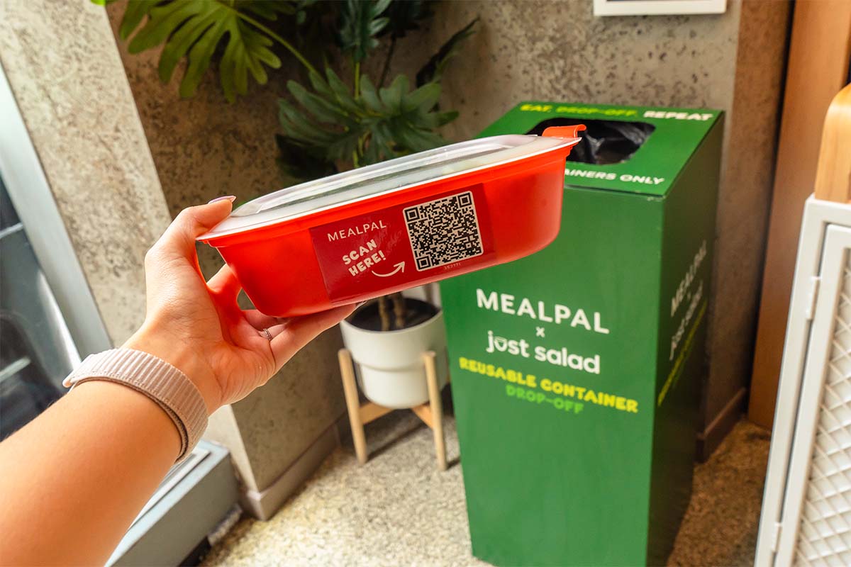 A sample reusable container and return bin for MealPal's new green initiative