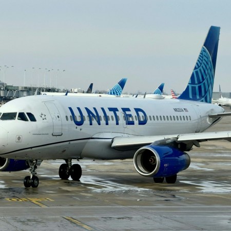A United Airlines airplane taxiing at an airport. Here's how United and American Airlines are joining in on Taylor Swift-Super Bowl ever.