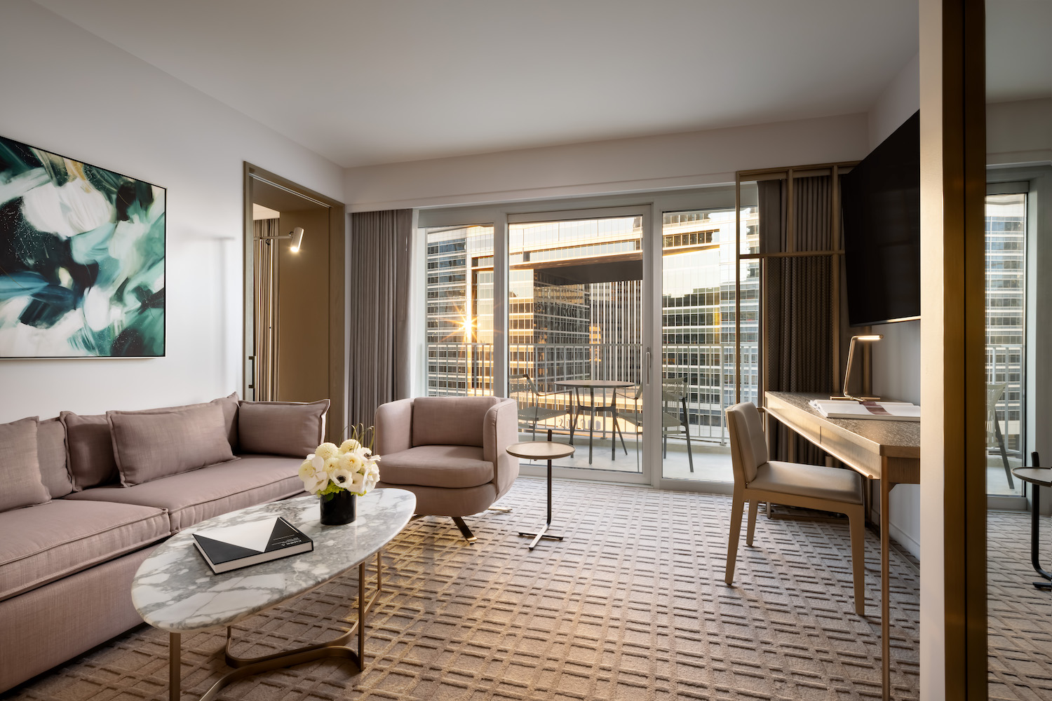 Living room area with a deck in the Studio King Suite