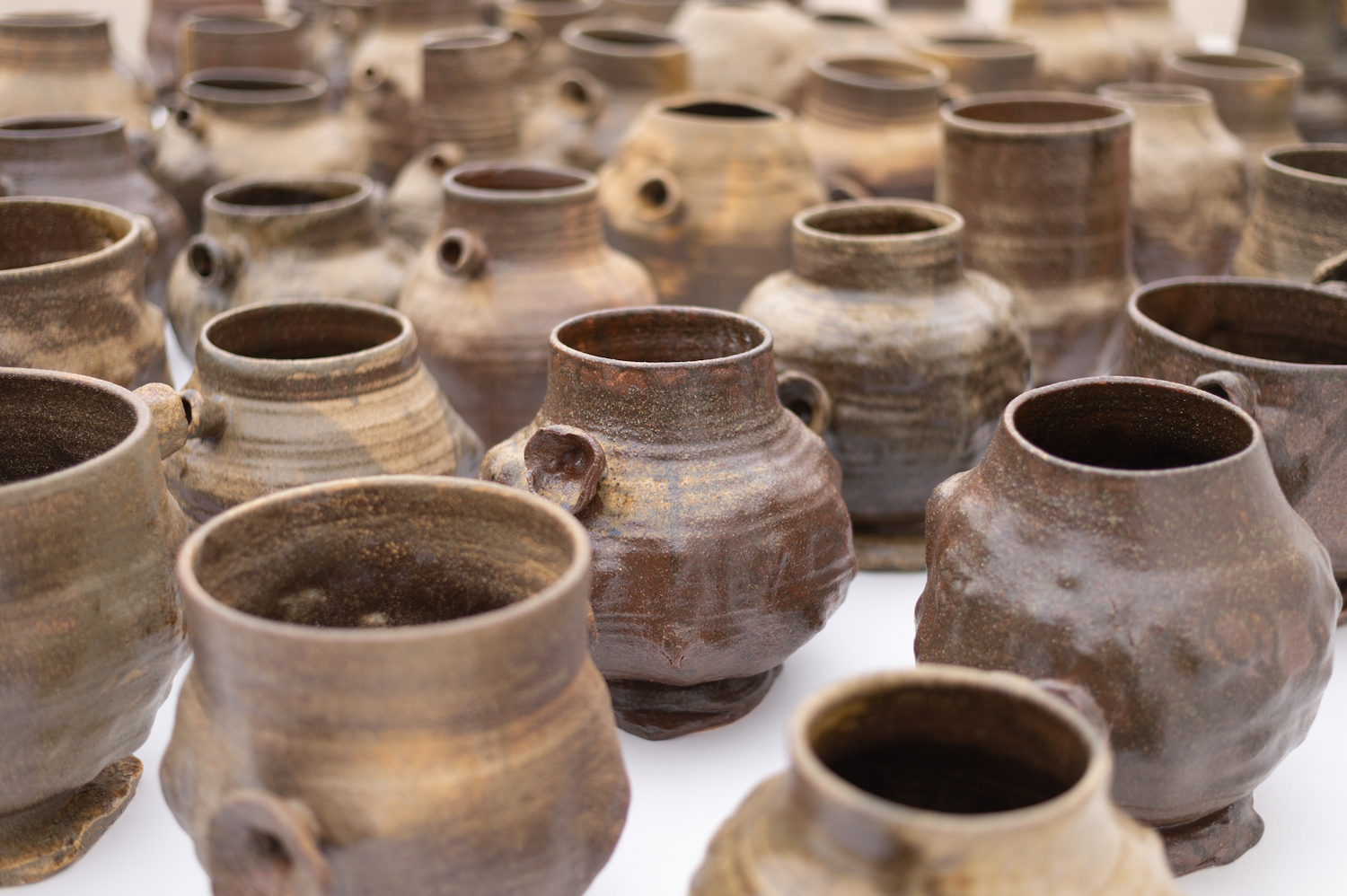 Dark-colored ceramic vases made from clay 