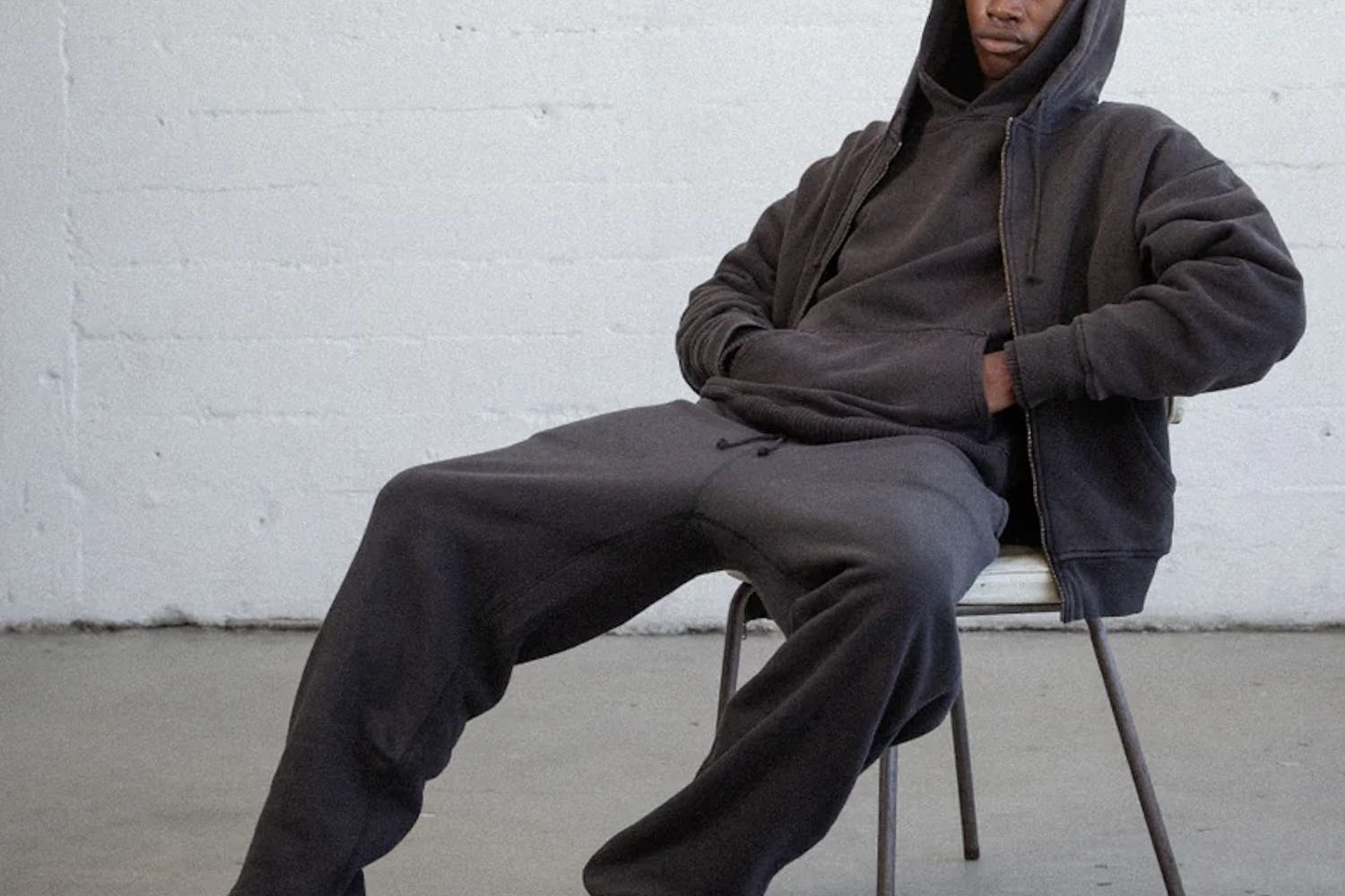 a model in black Elwood clothing