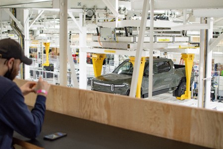 A Rivian plant with an R1T electric truck. The EV maker set a date for unveiling its new R2 model.