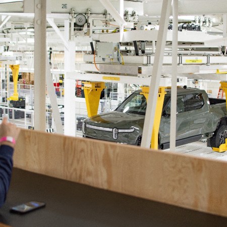 A Rivian plant with an R1T electric truck. The EV maker set a date for unveiling its new R2 model.