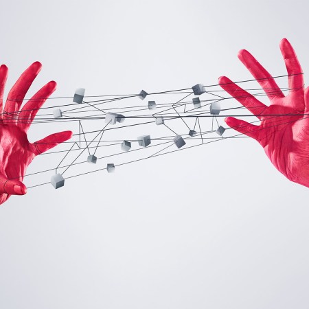 A cat's cradle illustration with red hands.