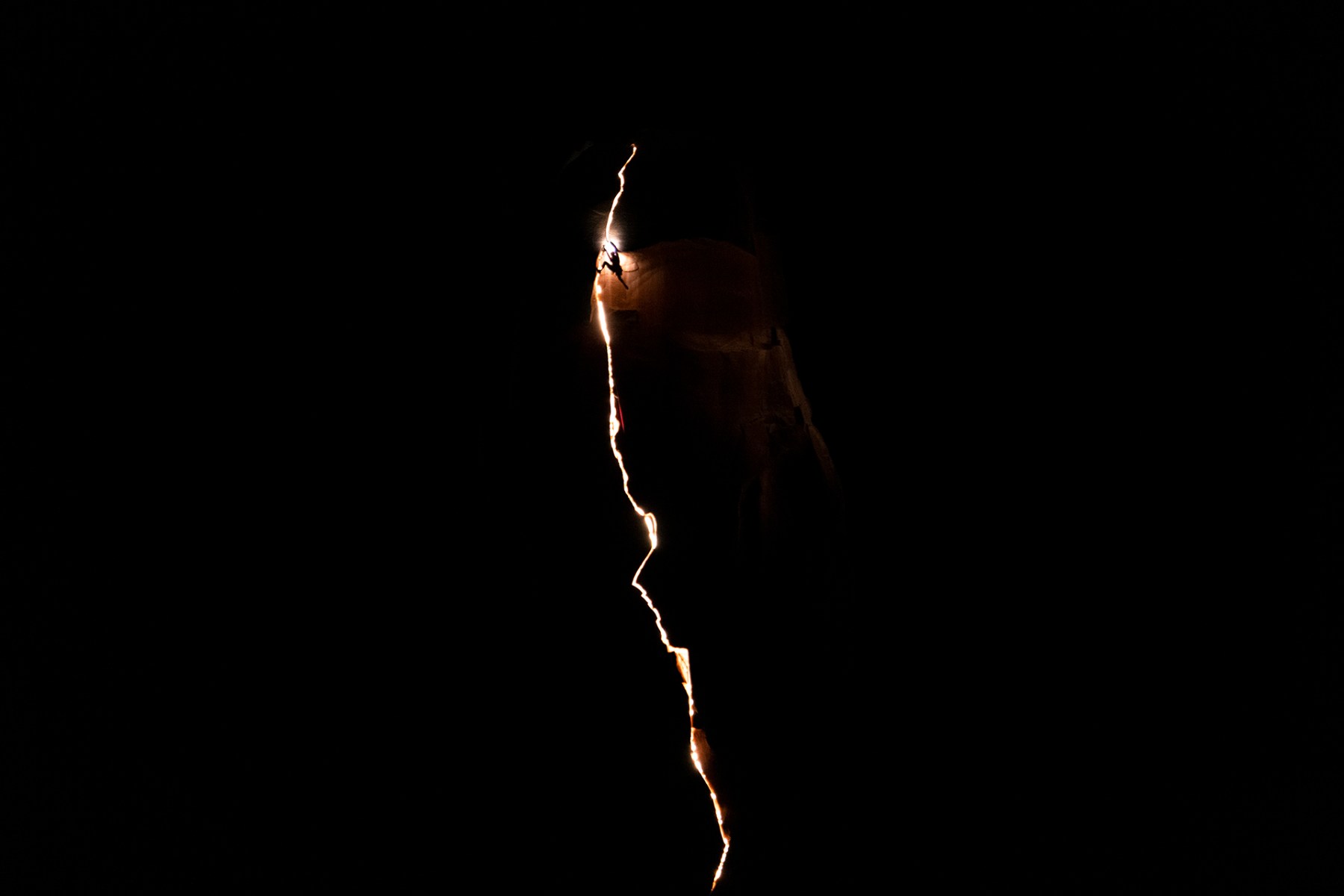 Basically, I rigged this crack on with a series of LED light tape inside so I could illuminate its formation. It's in Long Canyon just on the outskirts of Moab, Utah. It's definitely a fairly difficult climb and certainly one someone can't walk up to and scale, but this was more about trying to find a climb that had the right sort of formation or features that made it feel interesting. When I saw this formation from across the canyon, I just knew. I wanted omething that had a bit more character.<br>
