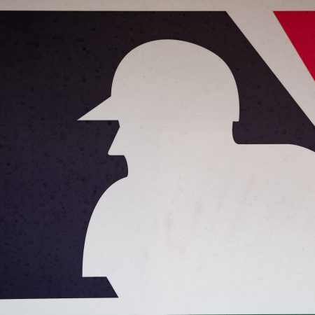 A general view of the MLB logo in a dugout.