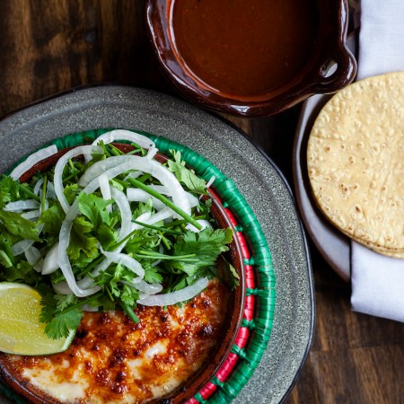 tortillas, dish with cilantro, lime, onionsn