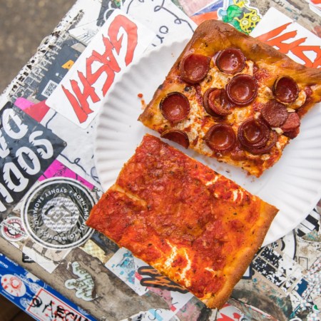 two slices of pizza, one pepporoni, one cheese, on a white paper plate