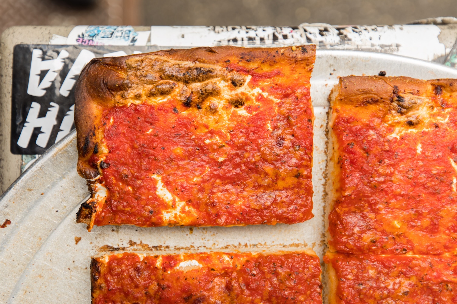slice of cheese pizza cut off the pie